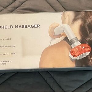 Handheld Massager with Red Accents